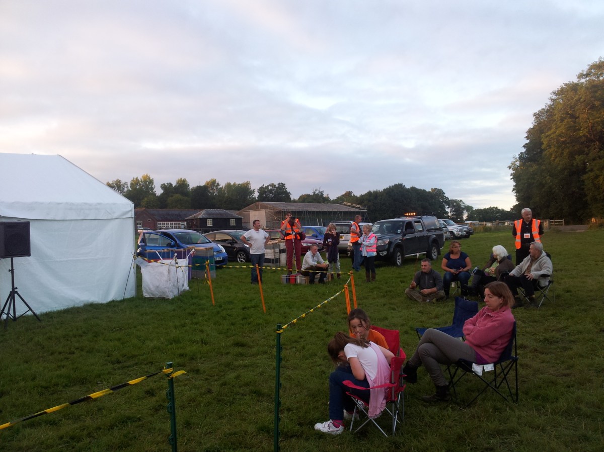 Alex hiding behind camera