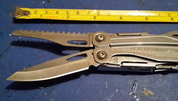 Give you an idea of the size of the Leatherman saw blade and knife blade (the knife was not fully opened and locked in place)