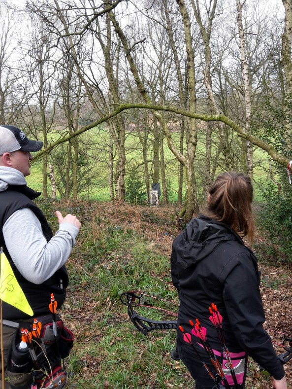 Martyn and Sarah preparing to shoot paper face bear