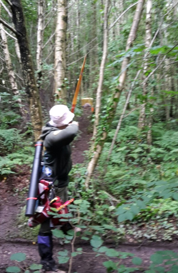 Sharon shooting 3D tortoise from white peg