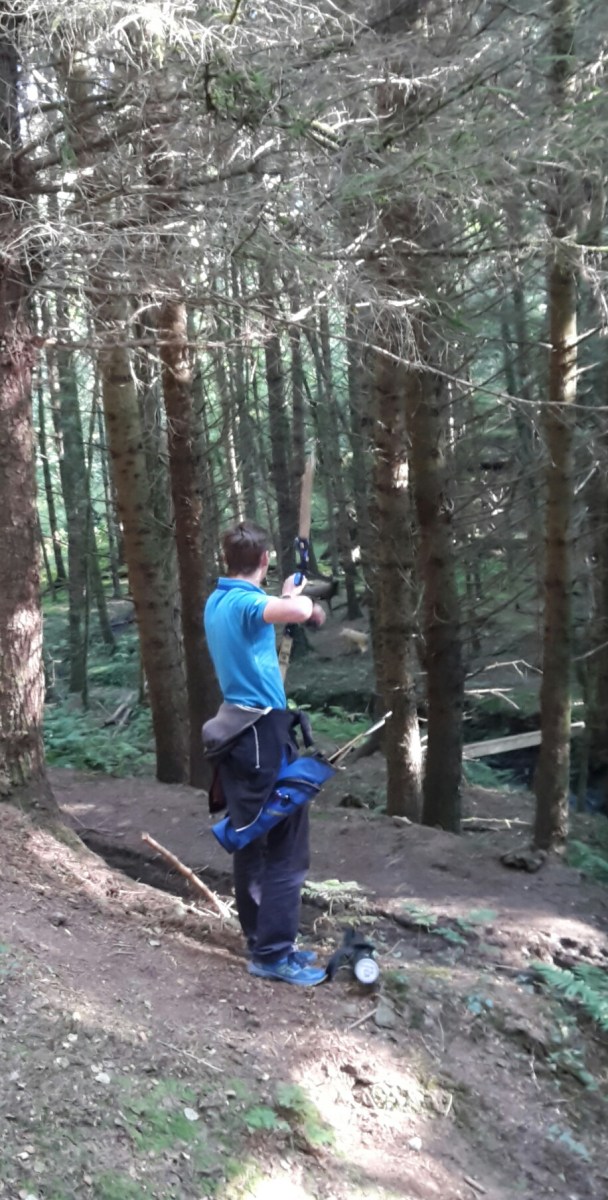 Chris on white peg shooting the 3D elk