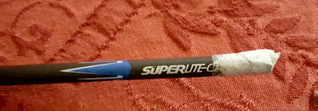 Broken Carbon arrow wrapped in tape