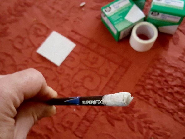 Broken Carbon arrow wrapped in tape close up