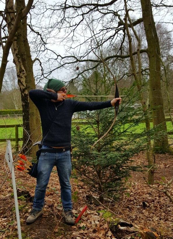 Wayne shooting complete with unique hat